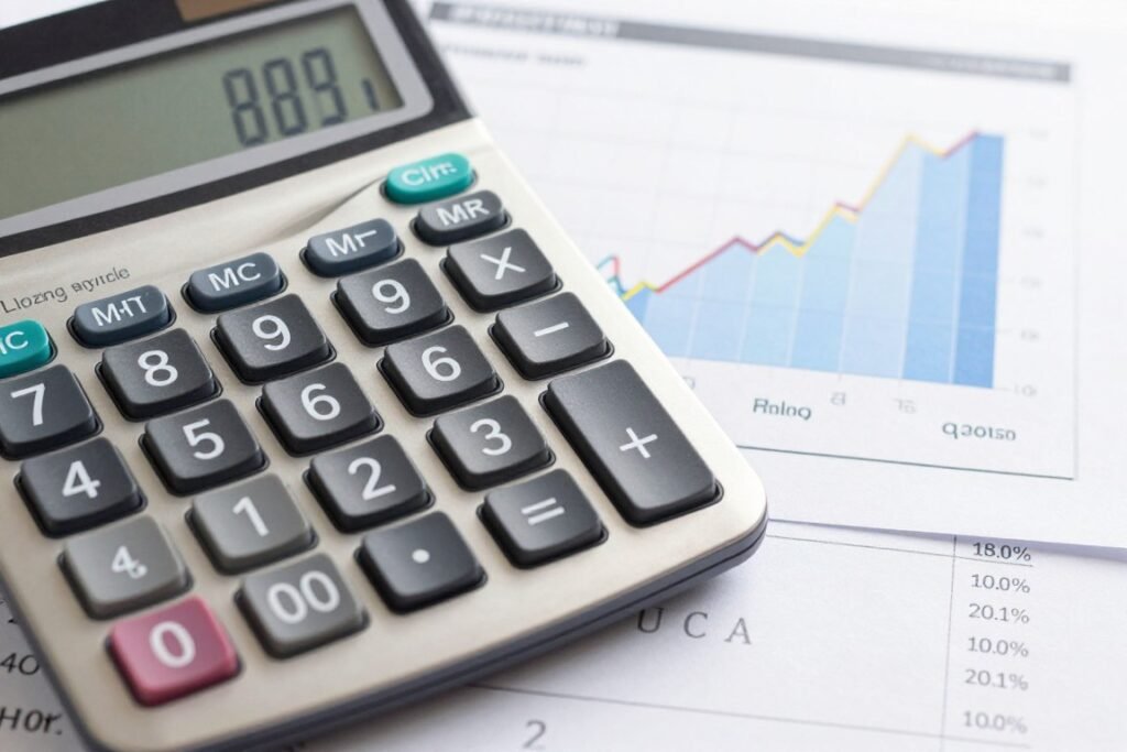 calculator showing tax savings with financial charts